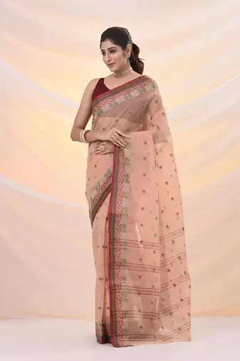 Beige pure cotton tant saree with woven designs