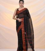 Black pure cotton tant saree with woven designs