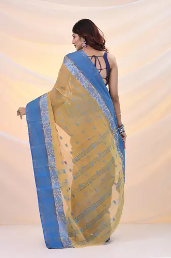 Light beige pure cotton tant saree with woven designs