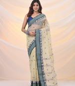 Ecru pure cotton tant saree with woven designs