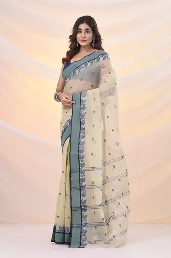 Ecru pure cotton tant saree with woven designs