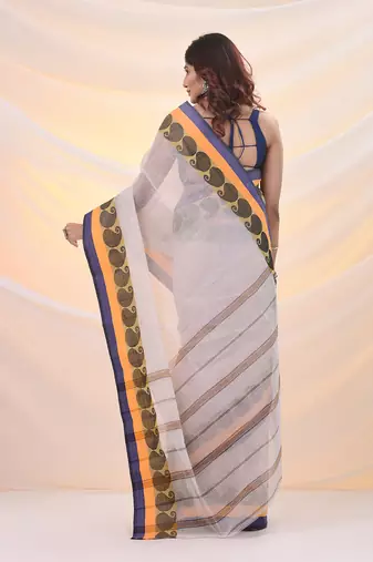 White pure cotton tant saree with woven designs