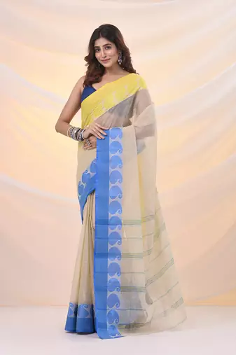 Cream pure cotton tant saree with woven designs