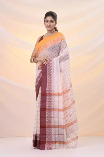 White pure cotton tant saree with woven designs