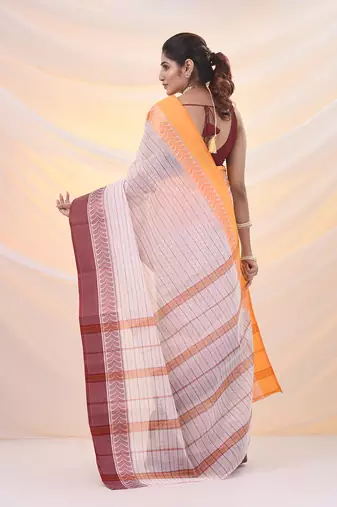 White pure cotton tant saree with woven designs