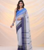 White pure cotton tant saree with woven designs
