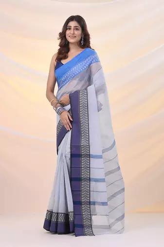 White pure cotton tant saree with woven designs
