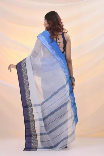 White pure cotton tant saree with woven designs