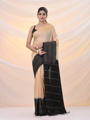 Beige silk blend saree with weaved borders 1