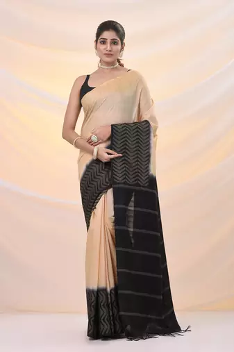 Beige silk blend saree with weaved borders