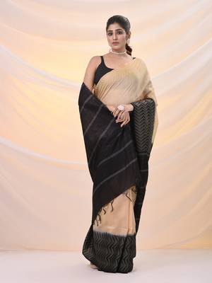 Beige silk blend saree with weaved borders 2