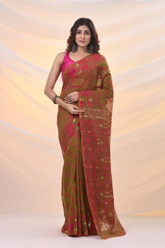Sap green silk cotton jamdani saree with woven designs