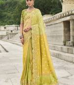Green and yellow stone silk blend saree