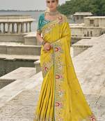 Yellow silk blend embroidered saree with contrast blouse