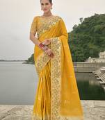 Yellow silk blend sequin embroidered patchwork border saree