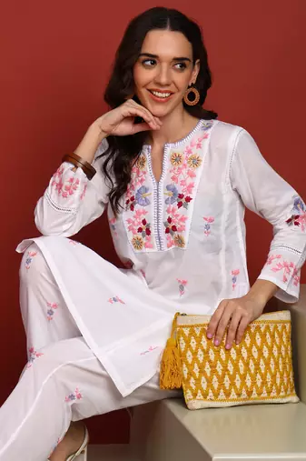 Women's elegant white handcrafted cotton chikankari ethnic motif kurta set