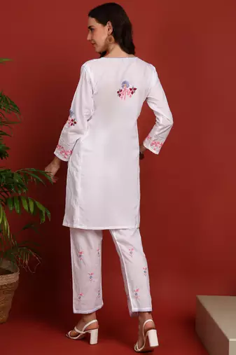 Women's elegant white handcrafted cotton chikankari ethnic motif kurta set
