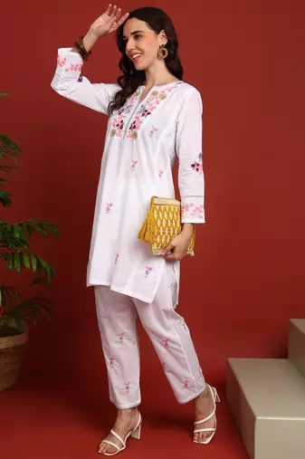 Women's elegant white handcrafted cotton chikankari ethnic motif kurta set