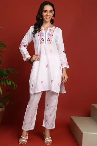 Women's elegant white handcrafted cotton chikankari ethnic motif kurta set