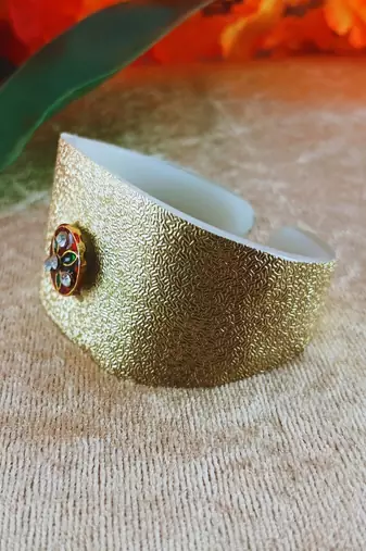 Golden acrylic kundan stud free size bracelets