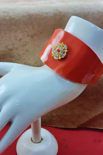 Orange acrylic kundan stud free size bracelets