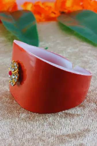 Orange acrylic kundan stud free size bracelets