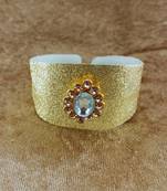 Golden acrylic kundan stud free size bracelets