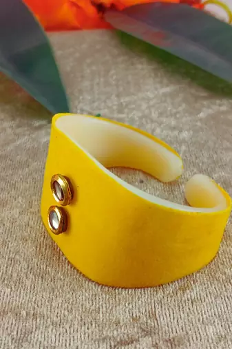 Yellow acrylic kundan stud free size bracelets