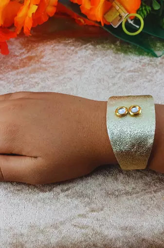 Golden acrylic kundan stud free size bracelets