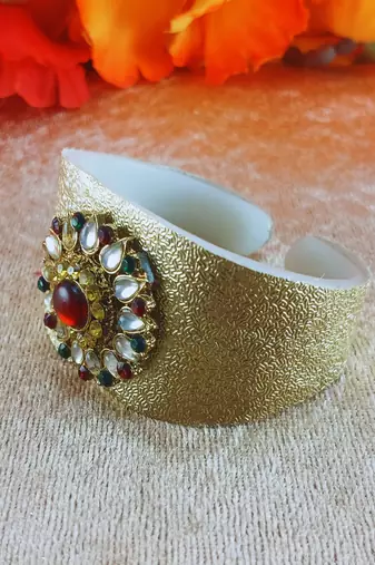Golden acrylic kundan stud free size bracelets