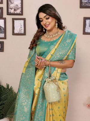 Yellow tissue silk blend saree with weaving zari work 3