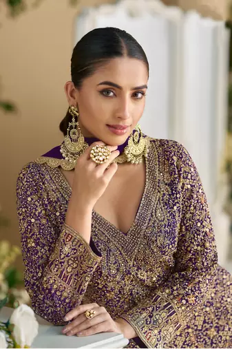 Purple embroidered georgette palazzo style salwar suit