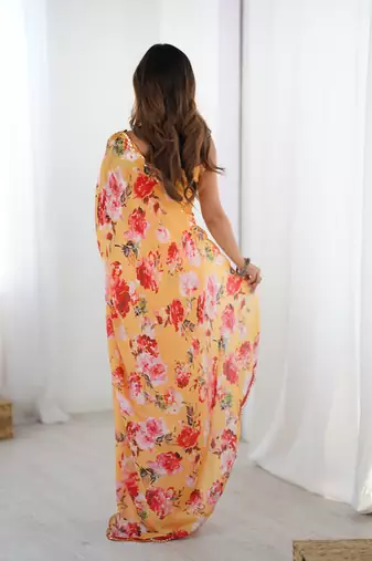 Orange printed chinon saree with border