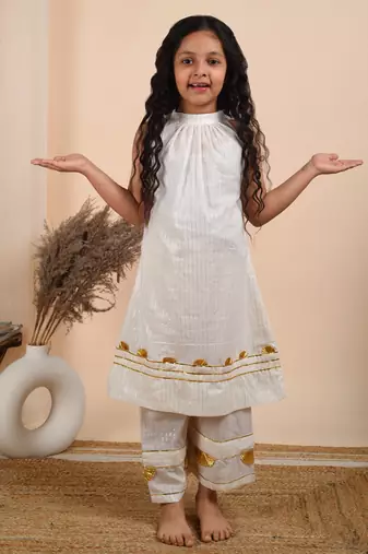Ivory cotton woven kurta paired with palazzo
