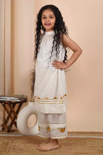 Ivory cotton woven kurta paired with palazzo