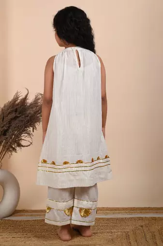 Ivory cotton woven kurta paired with palazzo