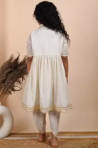 Ivory cotton woven kurta paired with dhoti