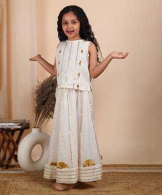 Ivory cotton woven top paired with skirt 2