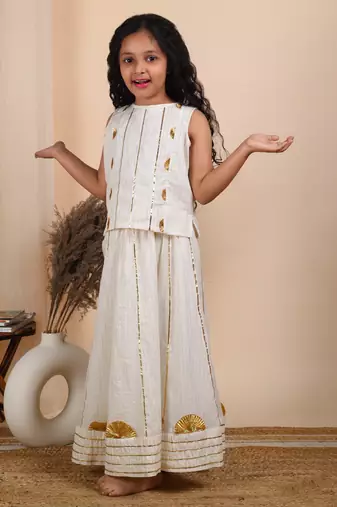 Ivory cotton woven top paired with skirt