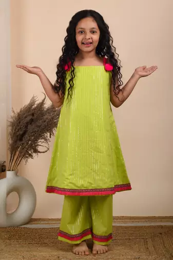Green cotton woven kurta paired with palazzo