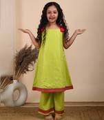 Green cotton woven kurta paired with palazzo