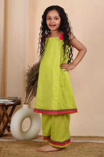 Green cotton woven kurta paired with palazzo