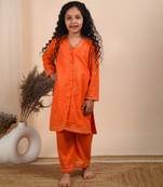 Orange cotton woven kurta paired with palazzo