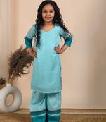 Blue cotton woven kurta paired with palazzo