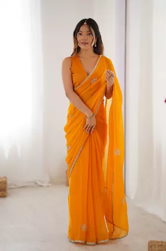 Yellow beads and sequin work saree