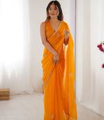 Yellow beads and sequin work saree