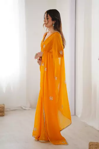 Yellow beads and sequin work saree