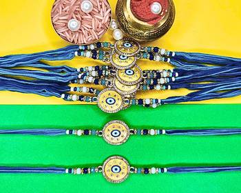 combo of 12 evil eye cotton thread with ad stones & meenakari designer rakhi for brother 1