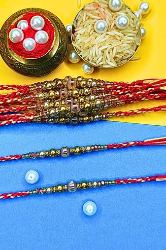 combo of 12 beaded cotton thread with ad stones & meenakari designer rakhi for brother