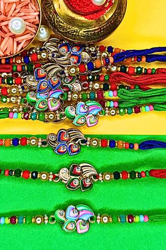 combo of 12 beaded cotton thread with ad stones & meenakari designer rakhi for brother